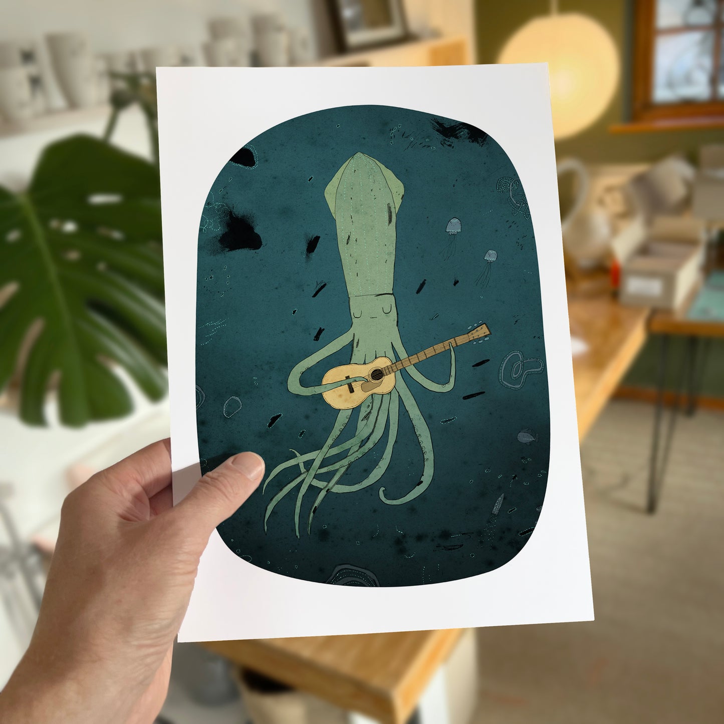 Squid playing a guitar